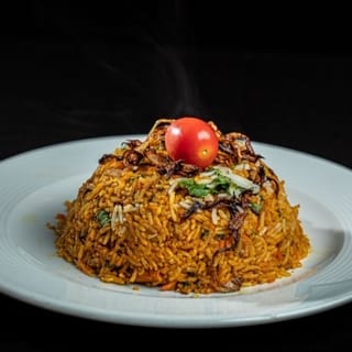 GOAT BIRYANI (BONE-IN)
